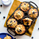 Lodge classic black muffin tin with six cups for baking muffins and cupcakes, made of durable metal.