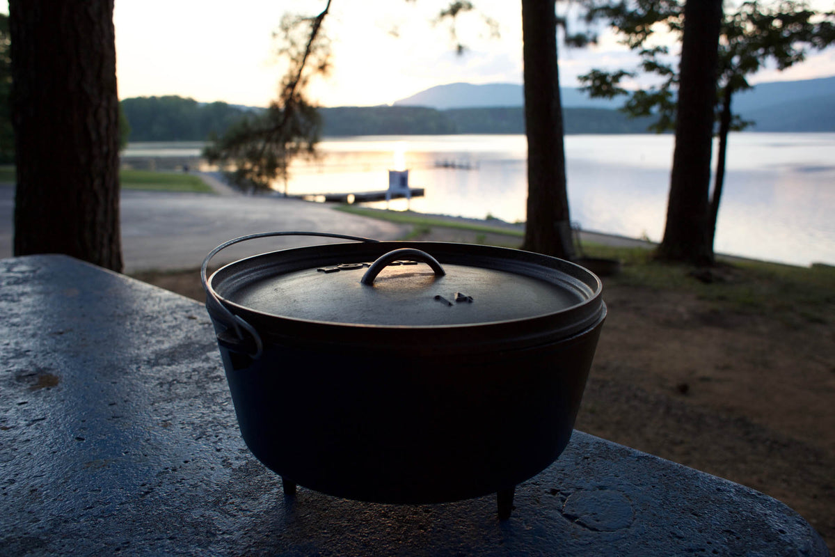 Lodge Classic black grill with a sturdy metal frame and cooking grate, perfect for outdoor grilling and barbecues.