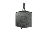 Lodge black square cast iron grill pan with 30.5 x 30.5 cm cooking surface for grilling and searing.