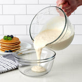 Blue ANCHOR HOCKING 1.9L mixing bowl with lid, versatile measuring and storage container for kitchen use.