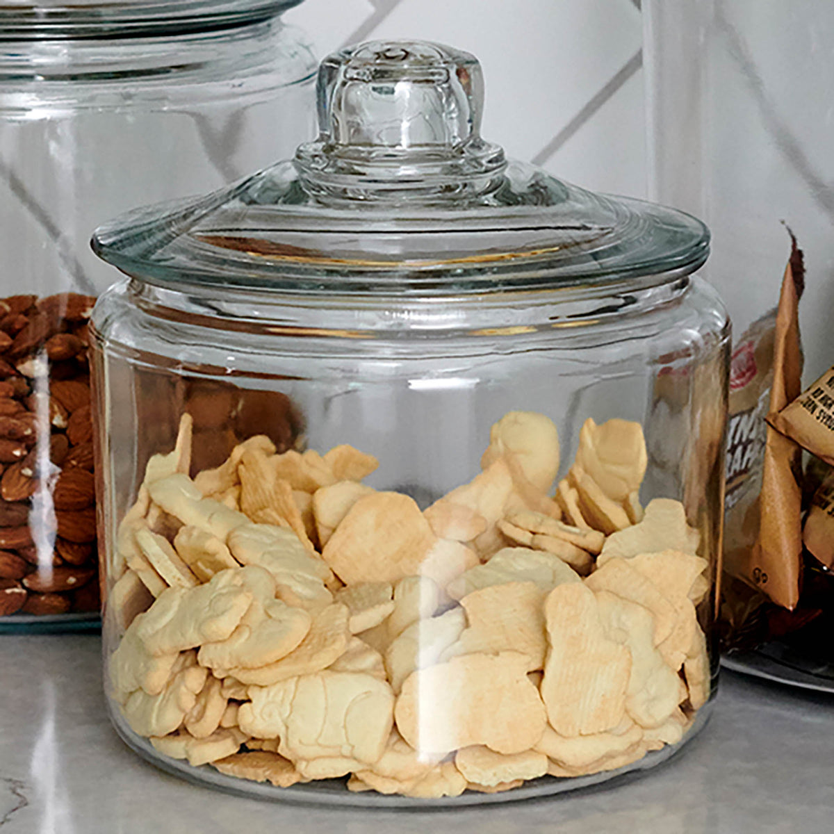 Anchor Hocking Heritage Hill storage jar, clear glass container with a lid, ideal for pantry organization and food storage.