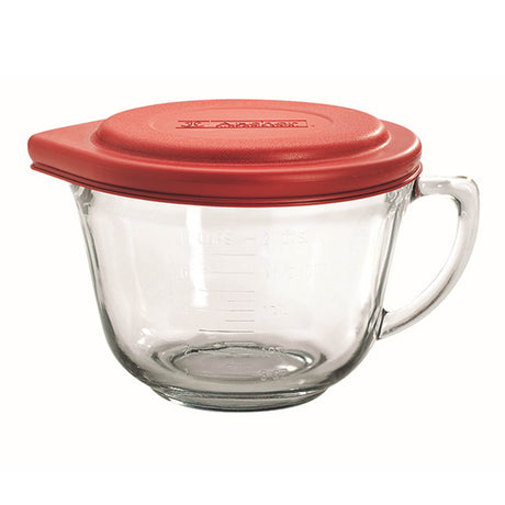 Red ANCHOR HOCKING mixing bowl with lid, 1.9L, made of durable glass, used for baking and food preparation.