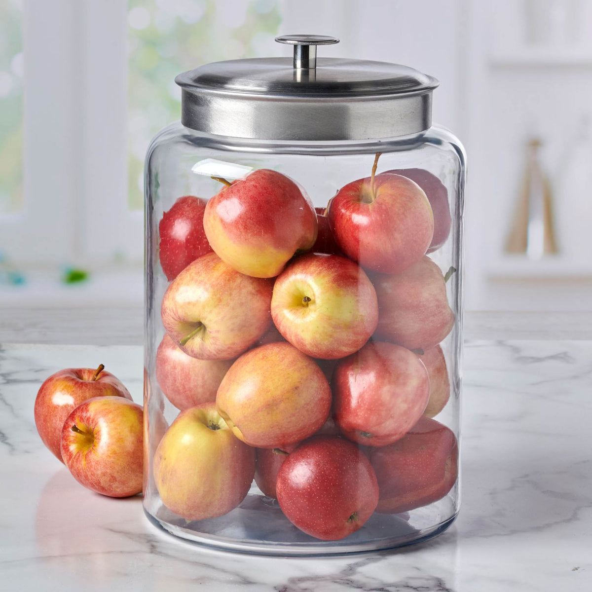 Anchor Hocking Montana storage jar with clear glass body and lid, ideal for kitchen organization and food storage.