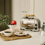 Stainless steel DUALIT Classic warming plate for keeping food warm, with a sleek and modern design.