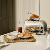 Dualit Classic stainless steel warm-up plate for keeping food warm, with a sleek and durable design.