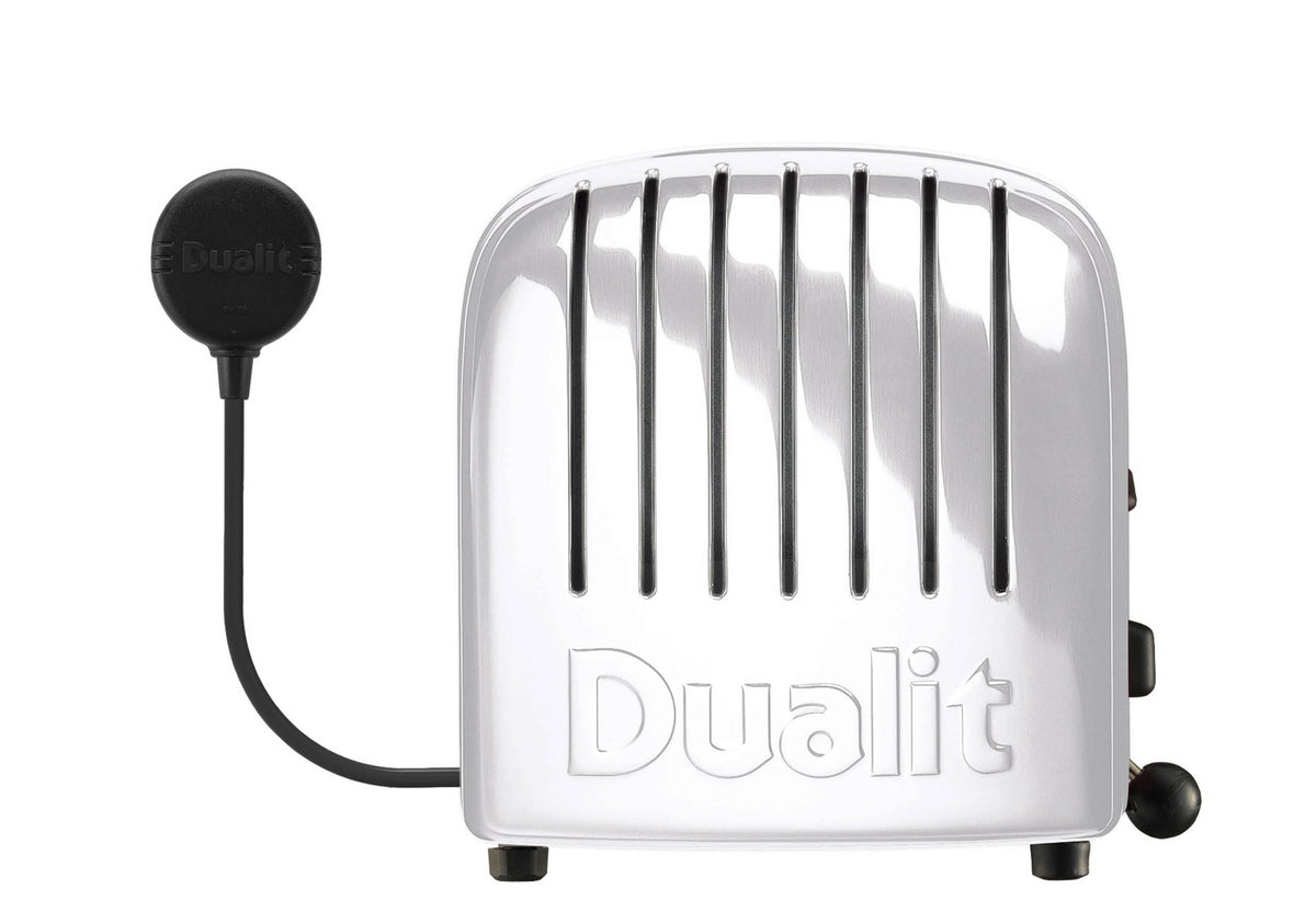 Dualit Newgen white 2-slice toaster with modern design and metal finish, featuring control levers and browning control.