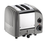 Dualit Newgen silver metallic 2-slice toaster with modern design and sleek finish, perfect for toasting bread and bagels.