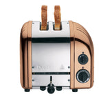 Dualit Newgen polished 2-slice toaster with sleek design, featuring control knobs and slots for toasting bread slices.
