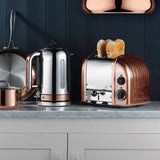 Dualit Newgen copper toaster with two slots, modern design, featuring a sleek metallic finish and four control dials.