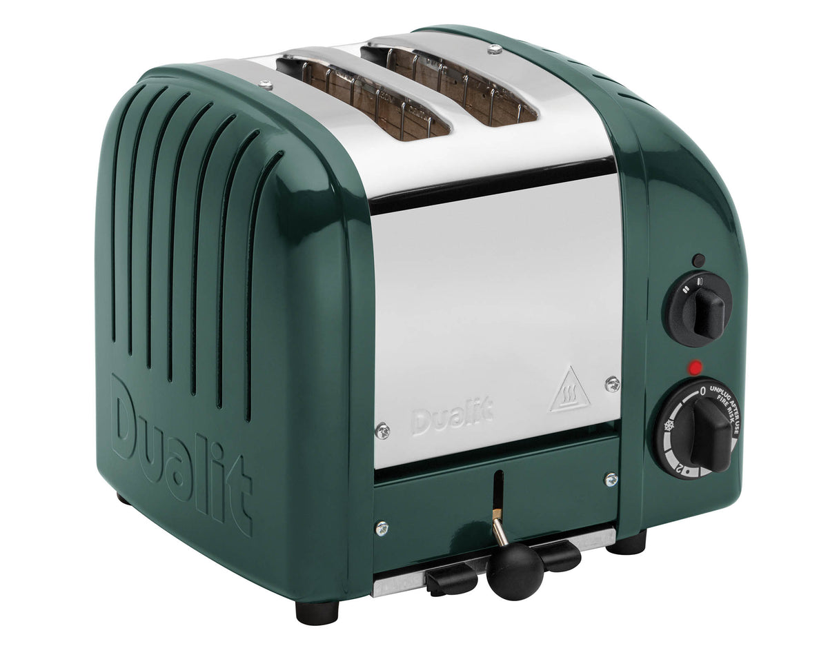 Dualit Newgen 2-slice evergreen toaster with modern design and stainless steel finish, featuring browning control and wide slots.