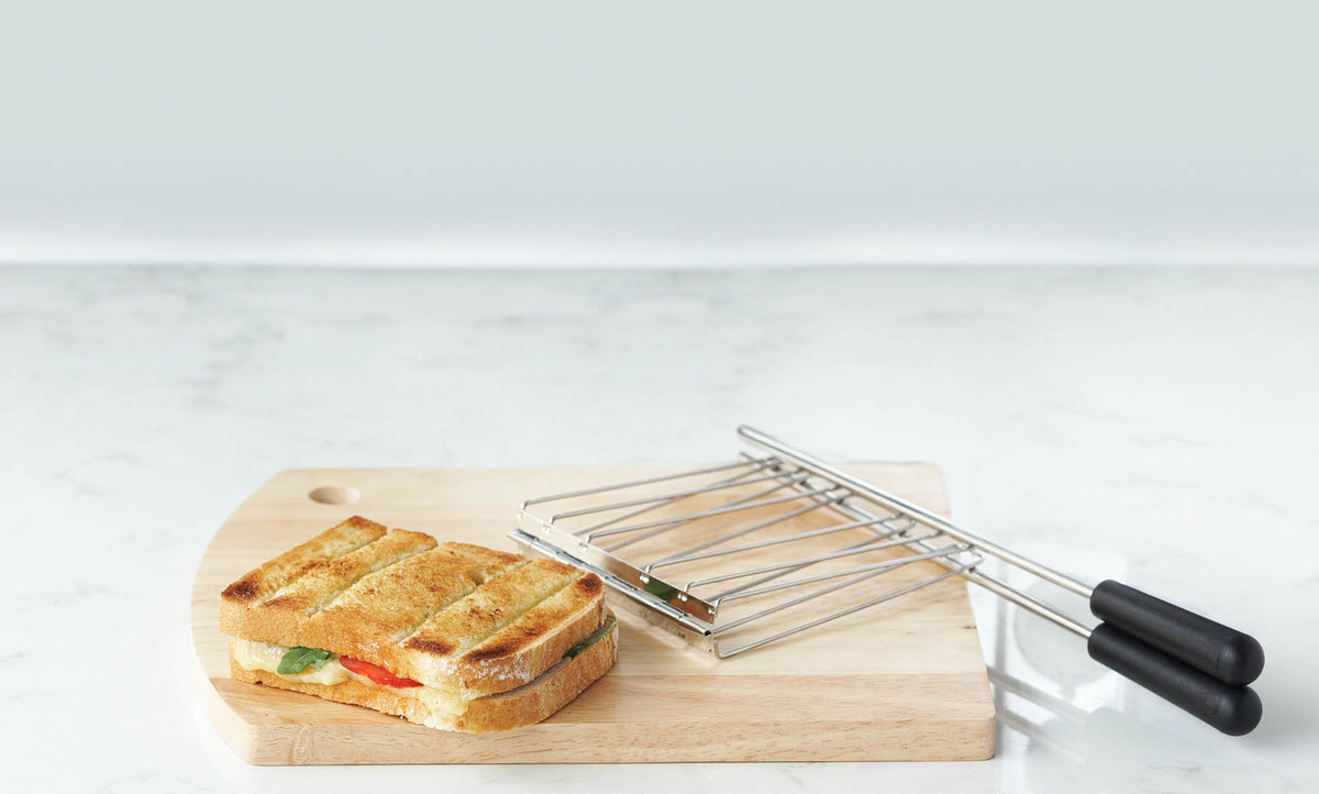Dualit 2-in-1 polished toaster with stainless steel finish, featuring two slots for toasting bread slices.