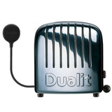 Polished DUALIT VARIO toaster with four slots for toasting bread slices, shown in a sleek, modern kitchen setting.