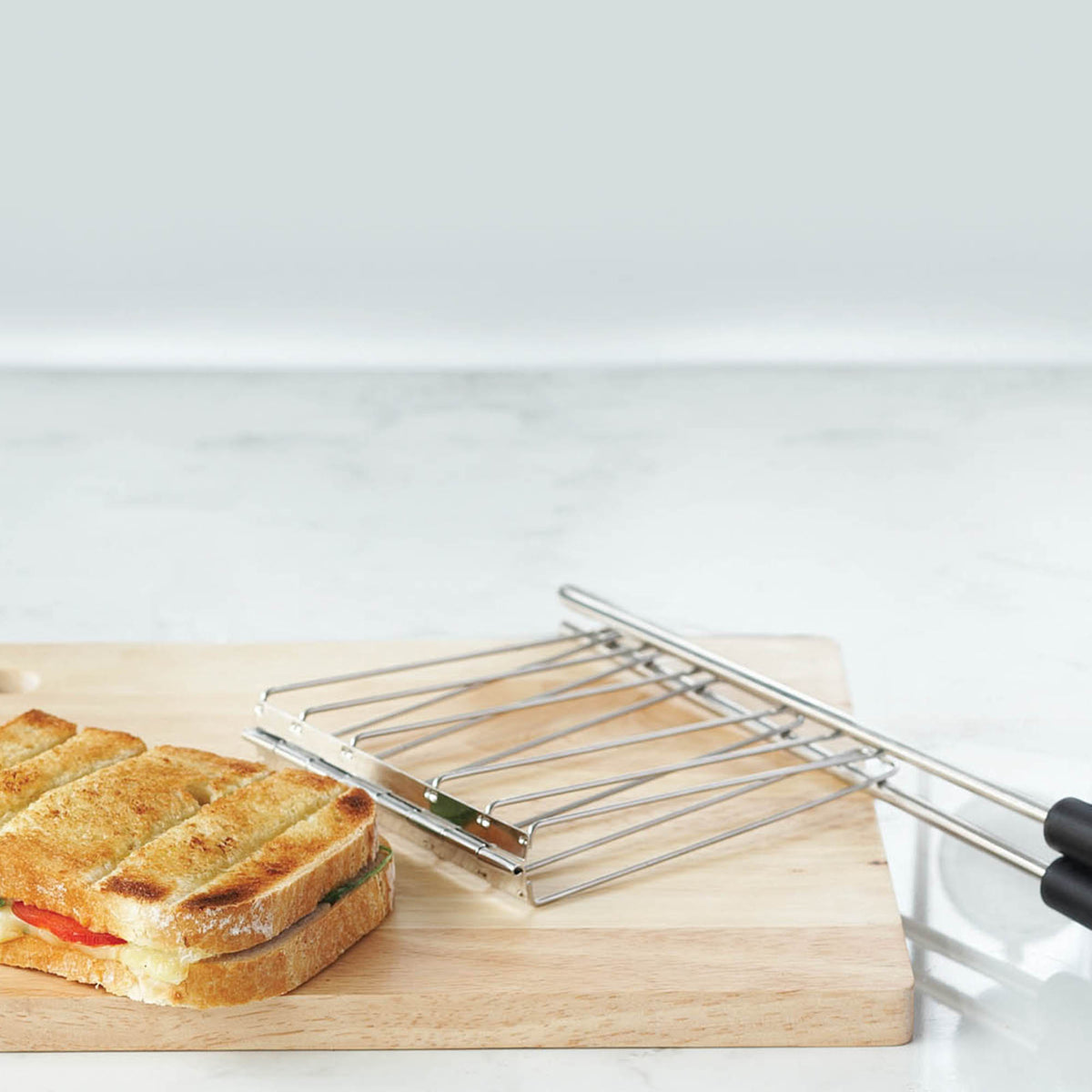 Dualit Classic stainless steel 6-slice toaster with modern design and multiple browning settings, suitable for large households.