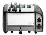 Dualit NewGen gray metallic 4-slice toaster with modern design and control levers, perfect for toasting bread and bagels.