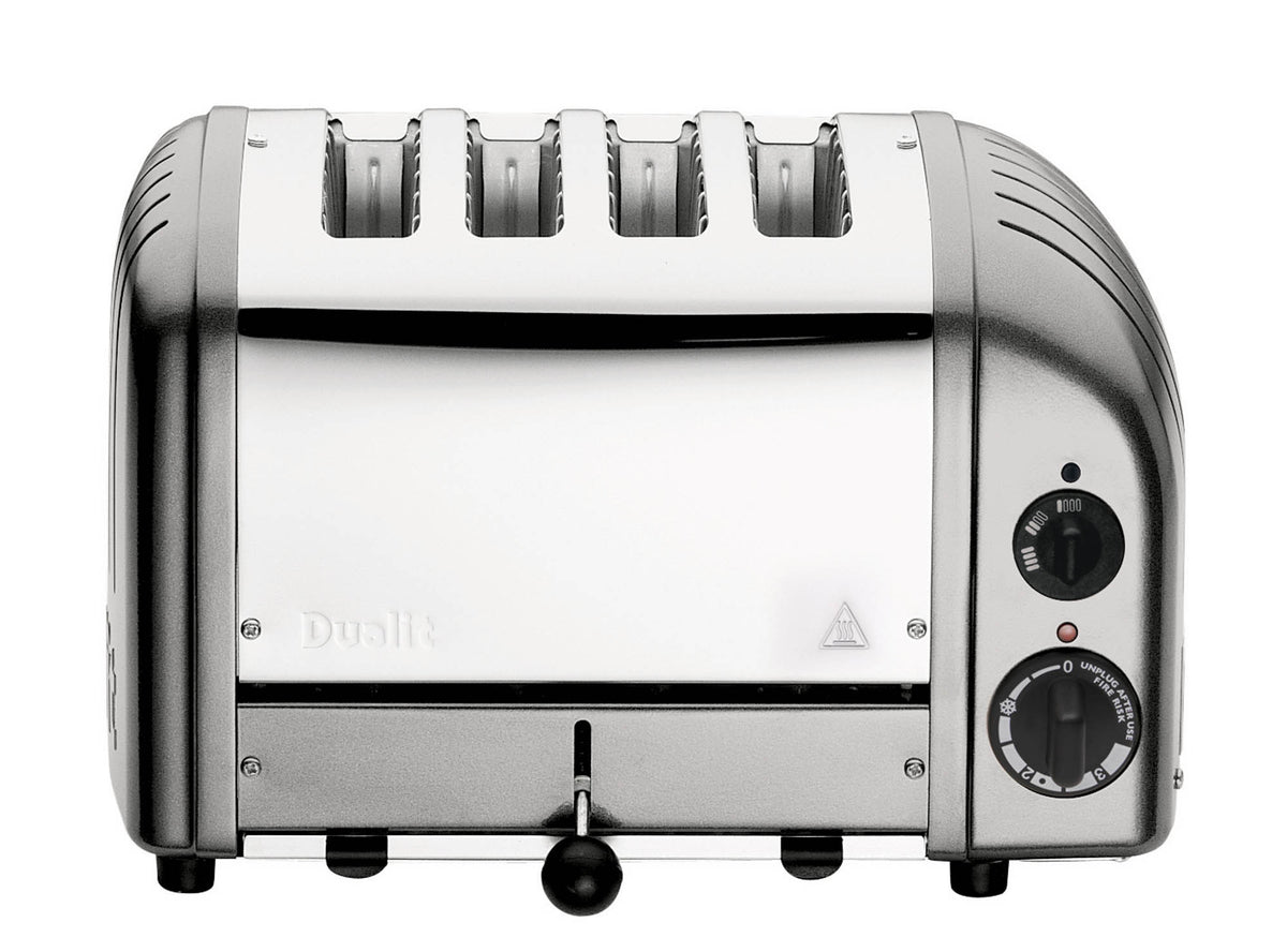 Dualit NewGen silver metallic 4-slice toaster with modern design, showing the front and control panel.