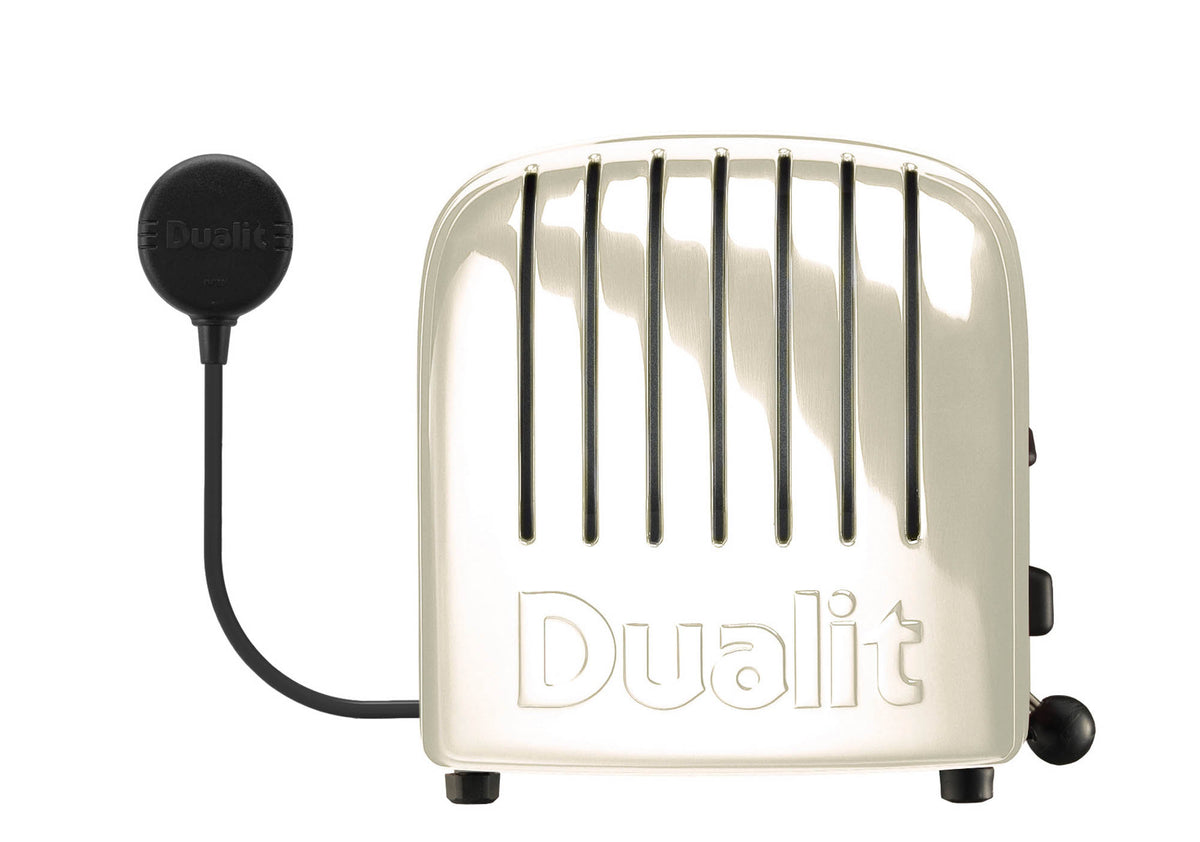 Dualit Newgen 4-slice cremeweiß toaster with modern design and adjustable browning control, ideal for toasting bread and bagels.