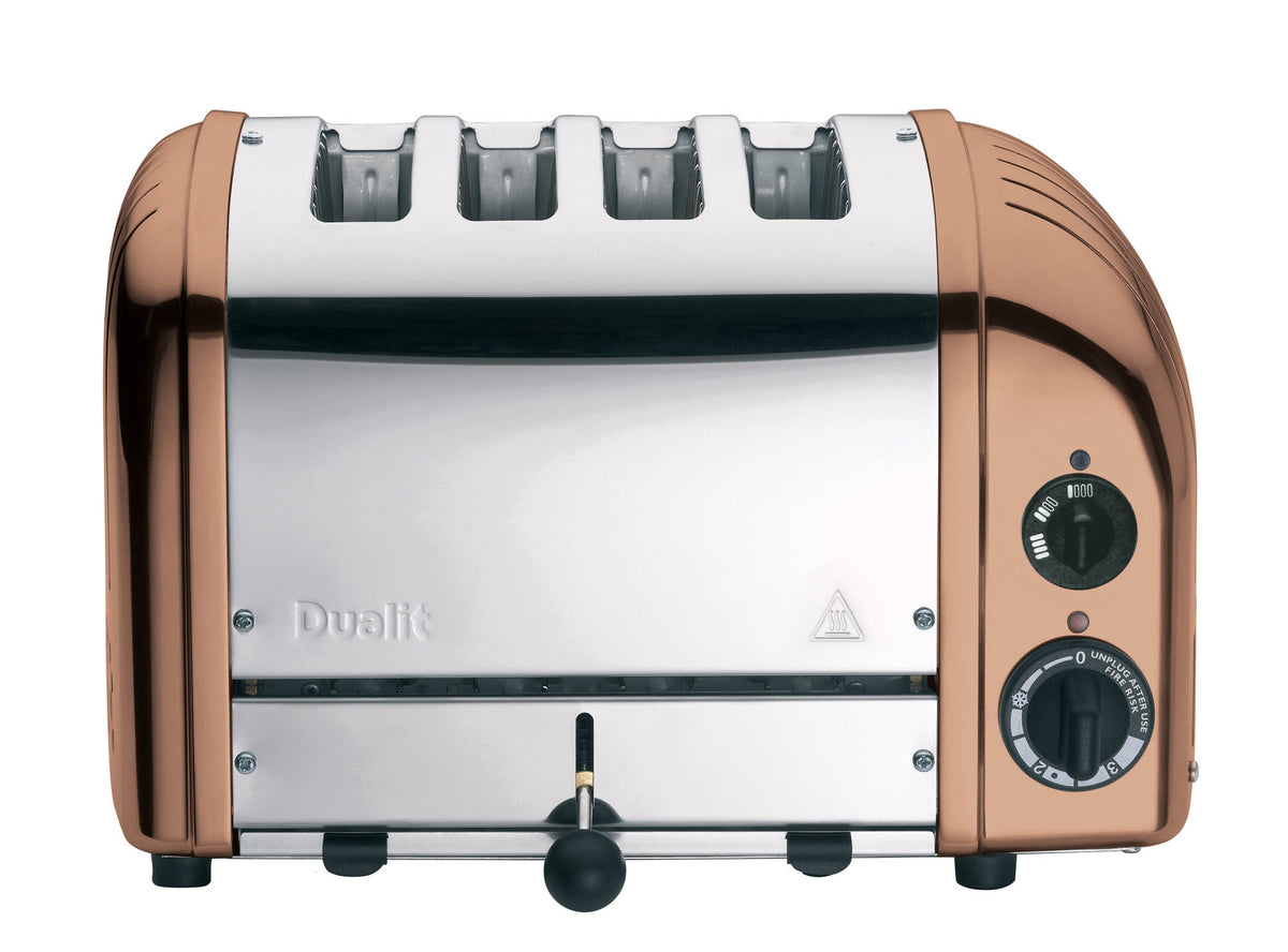 Dualit NewGen copper 4-slice toaster with modern design, featuring shiny copper finish and toast slots for quick breakfast preparation.