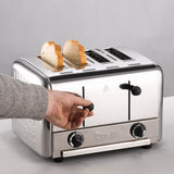 Dualit Gastro black pop-up toaster with two slots, featuring a sleek design and control buttons for toasting bread.