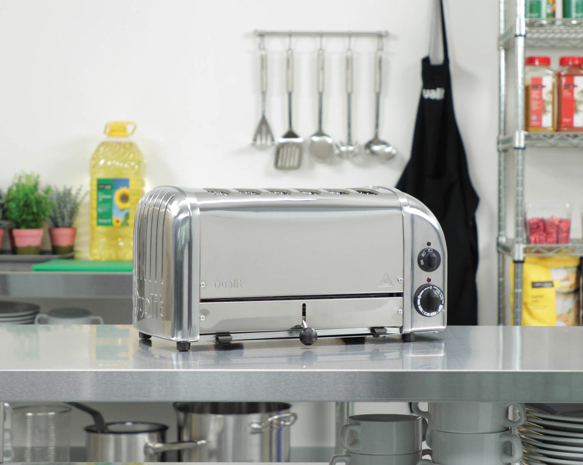 Polished DUALIT Newgen 6-slice toaster with modern design and digital controls, perfect for toasting bread and bagels.