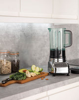 Polished DUALIT VORTECS stand mixer with stainless steel finish, featuring a large blending jar and control dial.