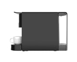 Dualit coffee capsule machine in black, compact 34 cm kitchen appliance with sleek design and easy capsule operation.