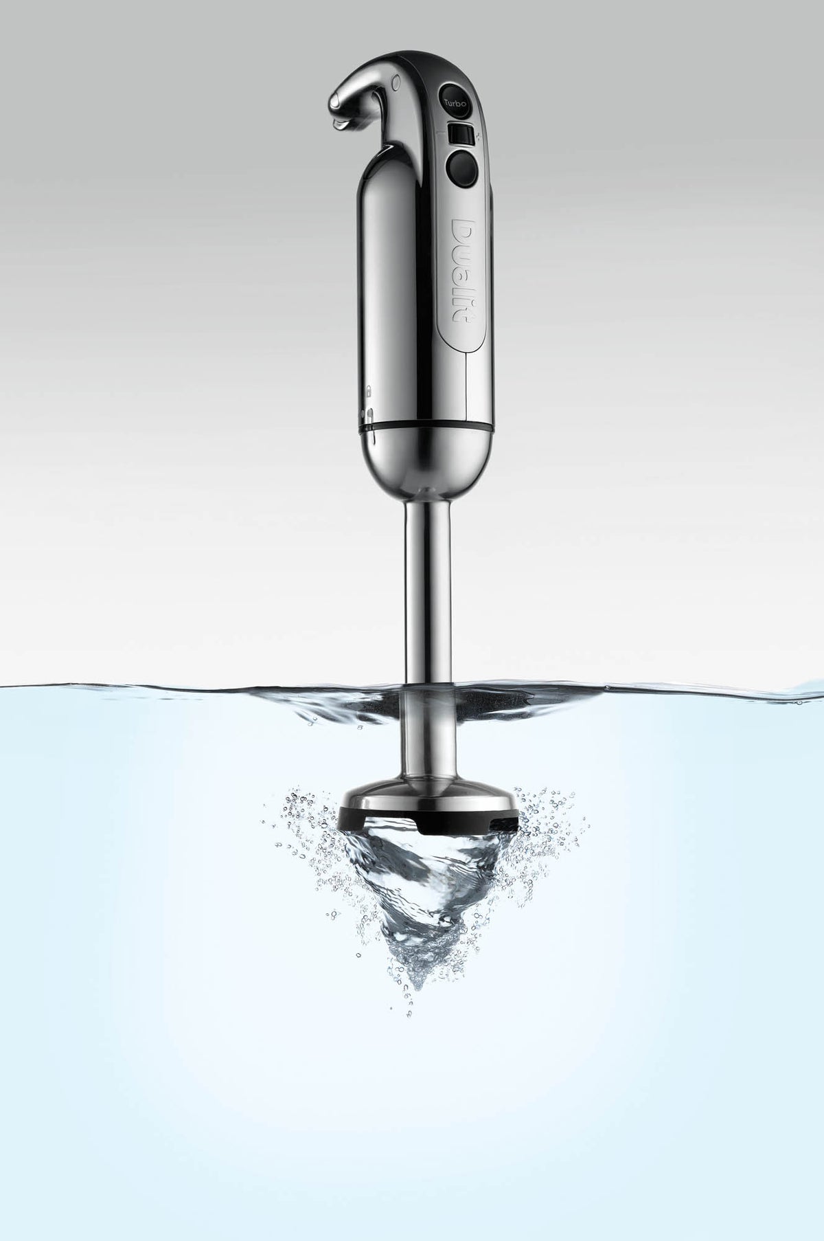 Dualit Classic polished hand blender with stainless steel blending shaft and ergonomic handle, ideal for mixing and blending.