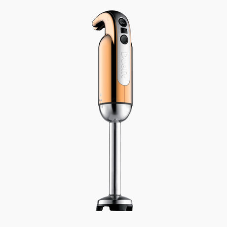 Dualit Classic copper hand blender with ergonomic handle and stainless steel blending shaft for efficient mixing.