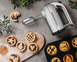 Dualit Classic polished hand blender with stainless steel shaft and ergonomic handle for versatile mixing and blending.