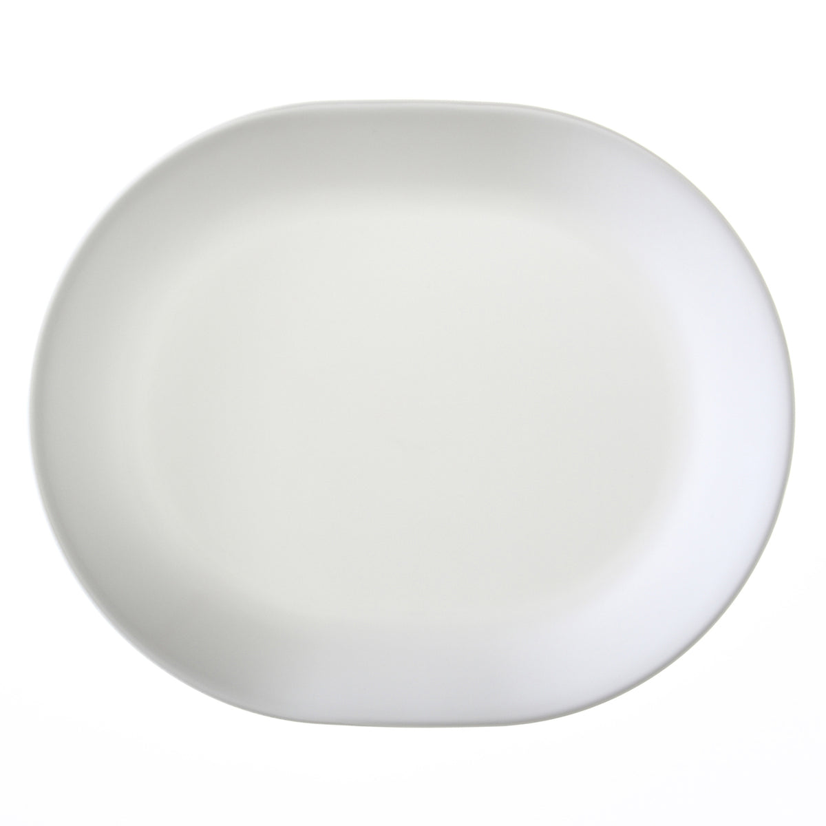 Corelle Winter Frost white dinnerware set with plates and bowls featuring a frosted snowflake design on a white background