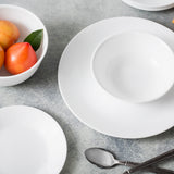 Corelle Winter Frost white dinnerware set featuring elegant, durable ceramic plates and bowls with a frosted winter design.