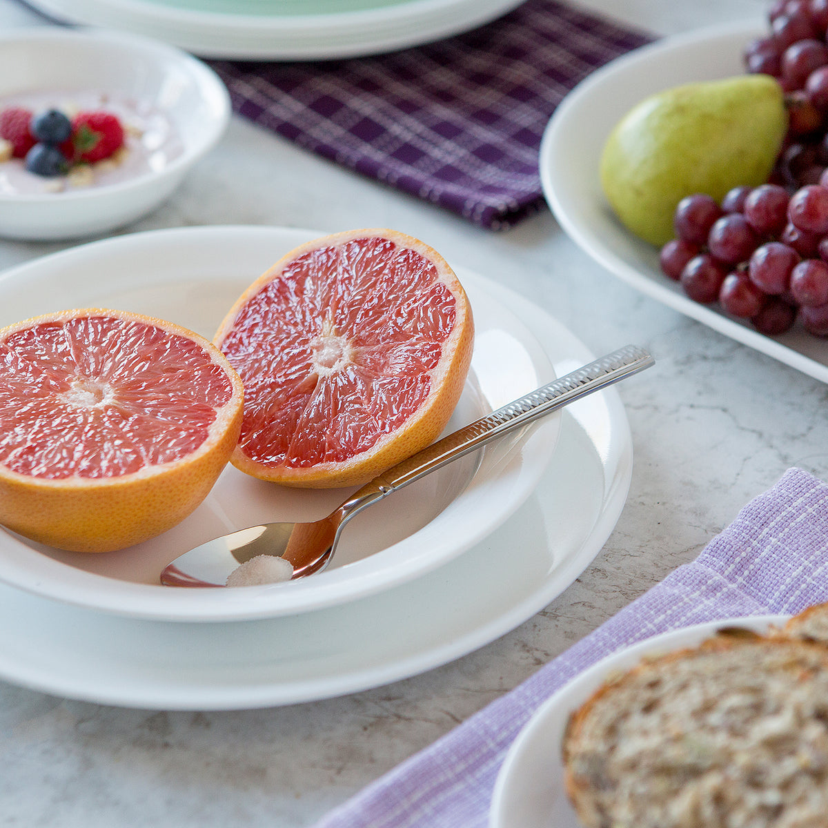 Corelle Winter Frost white dinnerware set with plates and bowls, durable ceramic dishes from the Corelle brand.