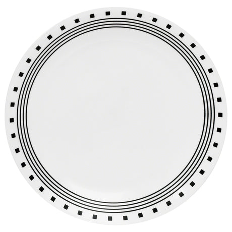 Corelle City Block white dinnerware set featuring plates, bowls, and mugs with a modern cityscape design.