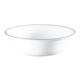 Corelle Mystic Grey dishware set featuring white plates with abstract grey graphic patterns, showcasing elegant tableware design.