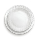 White CORELLE Linen Weave dinnerware set with elegant plates and bowls, showcasing a textured linen-inspired design.