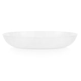 Corelle Winter Frost white dinnerware set with a frosted snowflake design on plates and bowls, showcasing elegant ceramic dishware.