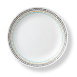 Corelle Paloma white dinnerware set with colorful graphic design, including plates and bowls, on a white background.