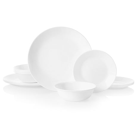 Corelle Winter Frost white dinnerware service with plates and bowls, featuring a classic winter frost pattern on glossy ceramic.