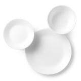 Corelle Winter Frost white dinnerware service set with plates, bowls, and cups on a table.