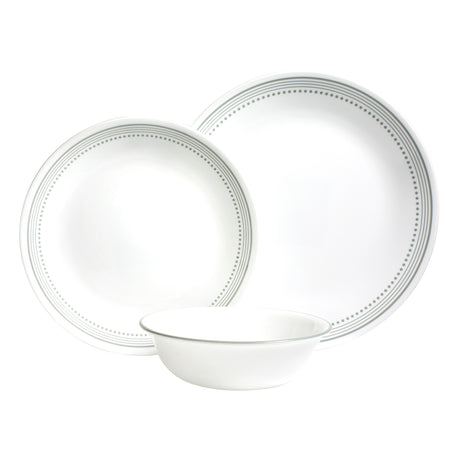 Corelle Mystic Gray dinnerware service featuring white plates and bowls with a modern gray pattern, perfect for everyday use.