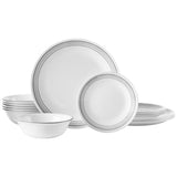 Corelle Mystic Gray dinnerware service set with white plates and dishes, showcasing elegant design and durable ceramic construction.