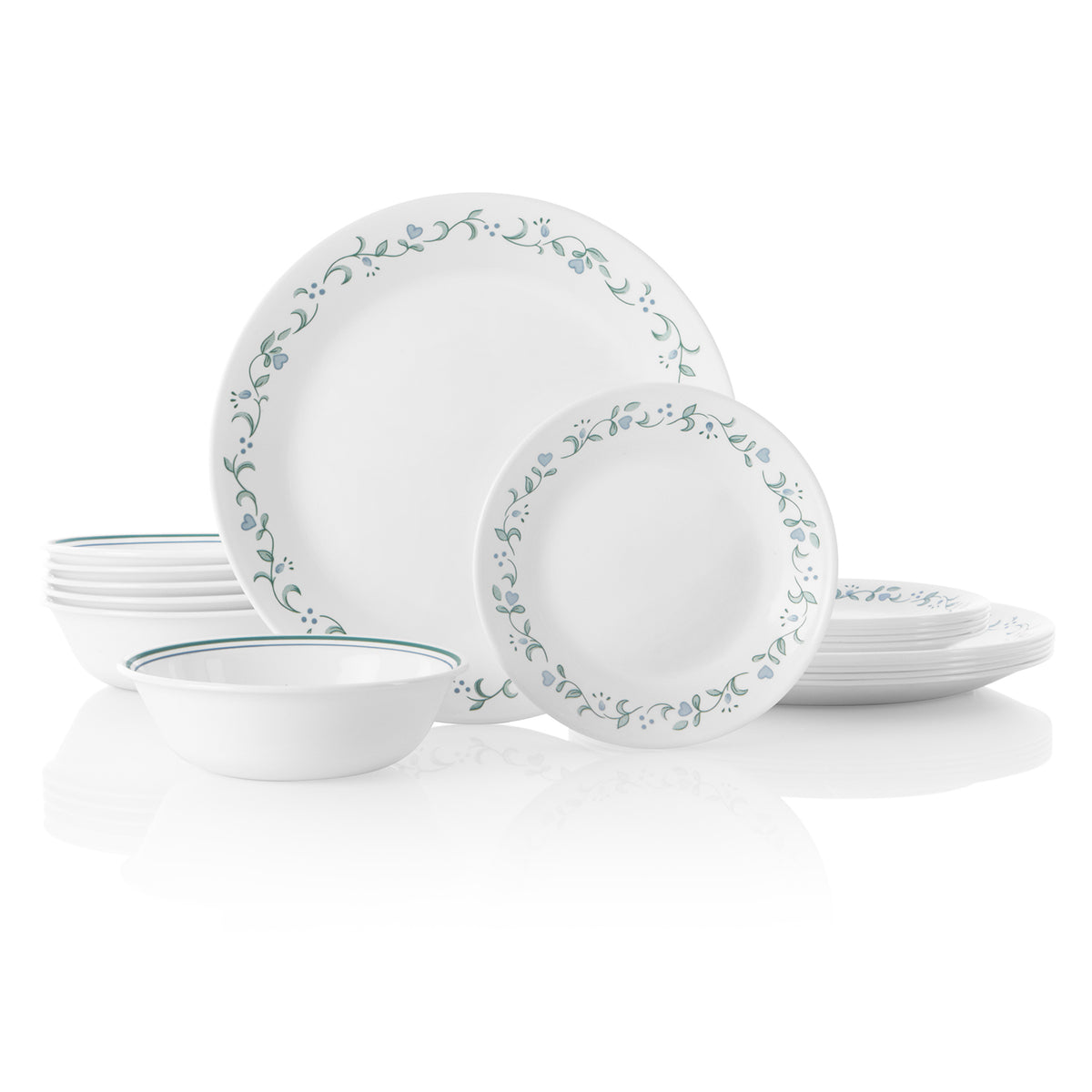 Corelle Country Cottage white dinnerware service set with plates and bowls arranged on a table.