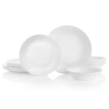 Corelle LINEN WEAVE white dinnerware service with plates and bowls arranged on a table for elegant dining.