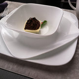 Corelle PURE WHITE dinner service set with white plates and bowls, featuring a simple, classic design for everyday use