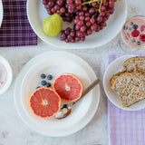 Corelle Winter Frost white dinnerware set featuring elegant, frosted glass design with clean lines and a smooth finish.