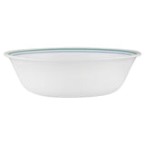 Corelle Country Cottage dinnerware set with white ceramic plates featuring charming graphic patterns, perfect for casual dining.