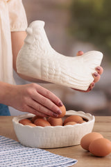 White ceramic hen figurine by Mason Cash, detailed with realistic features and a glossy finish.