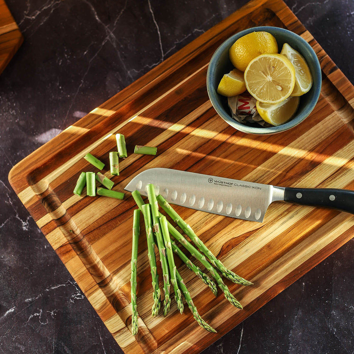 TEAKHAUS teak wood cutting board, rectangular traditional design, natural wood surface for food preparation and chopping.