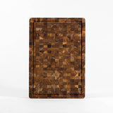 TEAKHAUS teak wood butcher block cutting and chopping board with smooth surface and natural wood grain for kitchen use.
