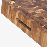 Teakhauss butcher block cutting board made of teak wood, rectangular shape with smooth surface for chopping and food prep.