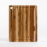 TeakHAUS Marine teakwood cutting board with smooth surface and natural wood grain for kitchen use.
